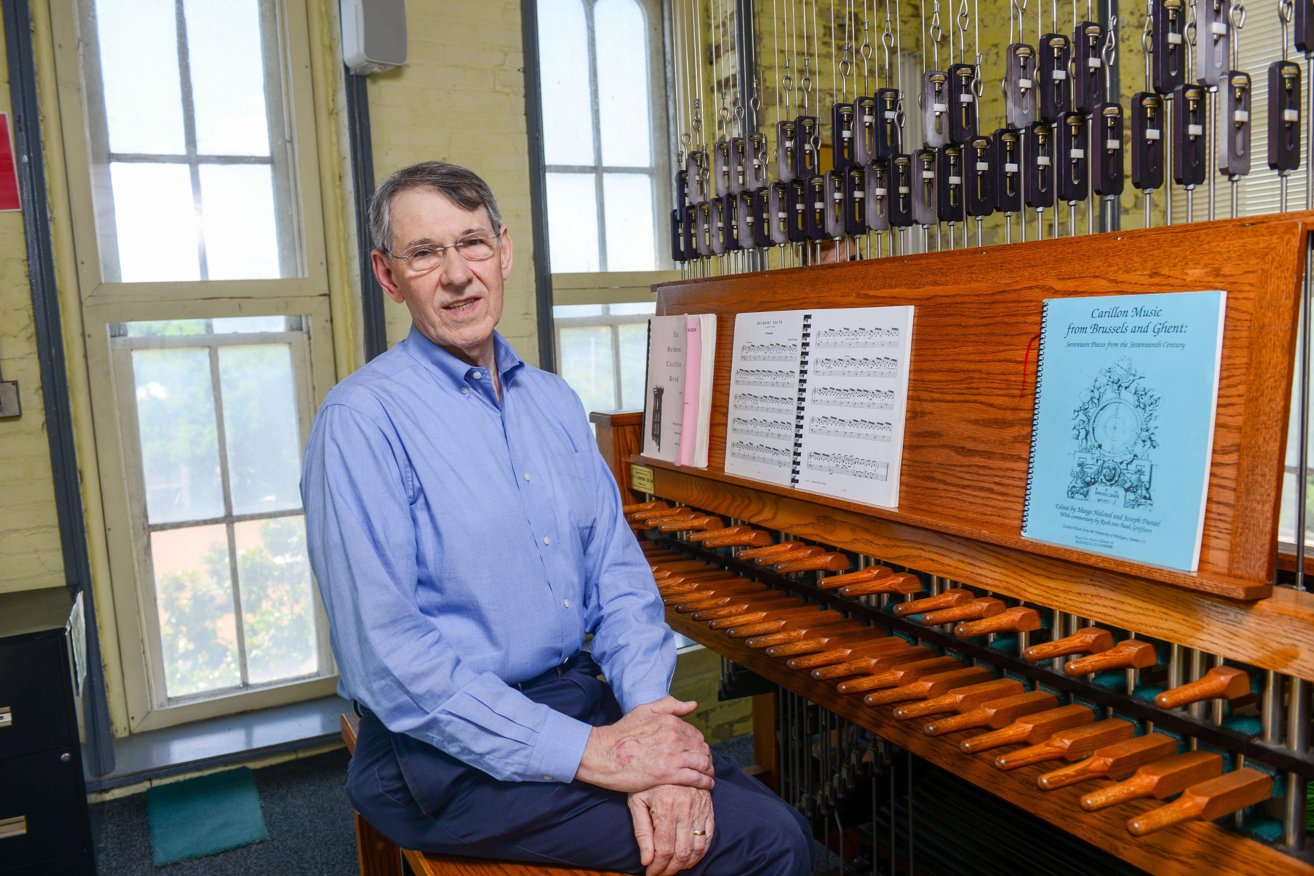 Dr. Richard Shadinger in front of the carillon system.