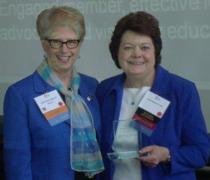 Dr. Cathy Hinton, right, receives the Carol Likens Award.