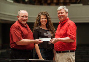 Bob Black, Jaimee Paul and Belmont Professor of Music Dr. Robert Gregg celebrate the orchestra donation.