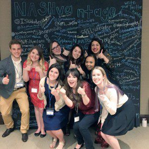 PRSSA student committee members and volunteers celebrating a successful first night.