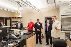  CSM Dean Dr. Thom Spence leads a tour of a Wedgewood Academic Center lab.