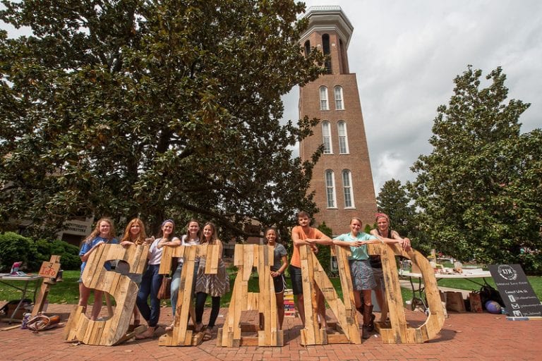 Students STAND Behind Bars for Charity