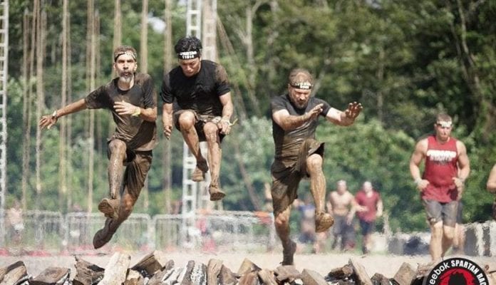 Three faculty members from the College of Theology and Christian Ministry compete in Spartan Race.