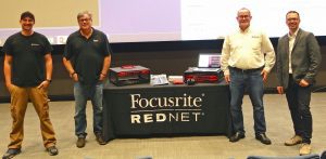 Romano, Reynolds, Howell and Farkus standing by Focusrite equipment