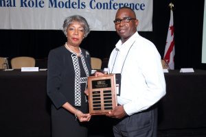 Gary Hunter accepts Belmont's award at the National Role Models Conference.