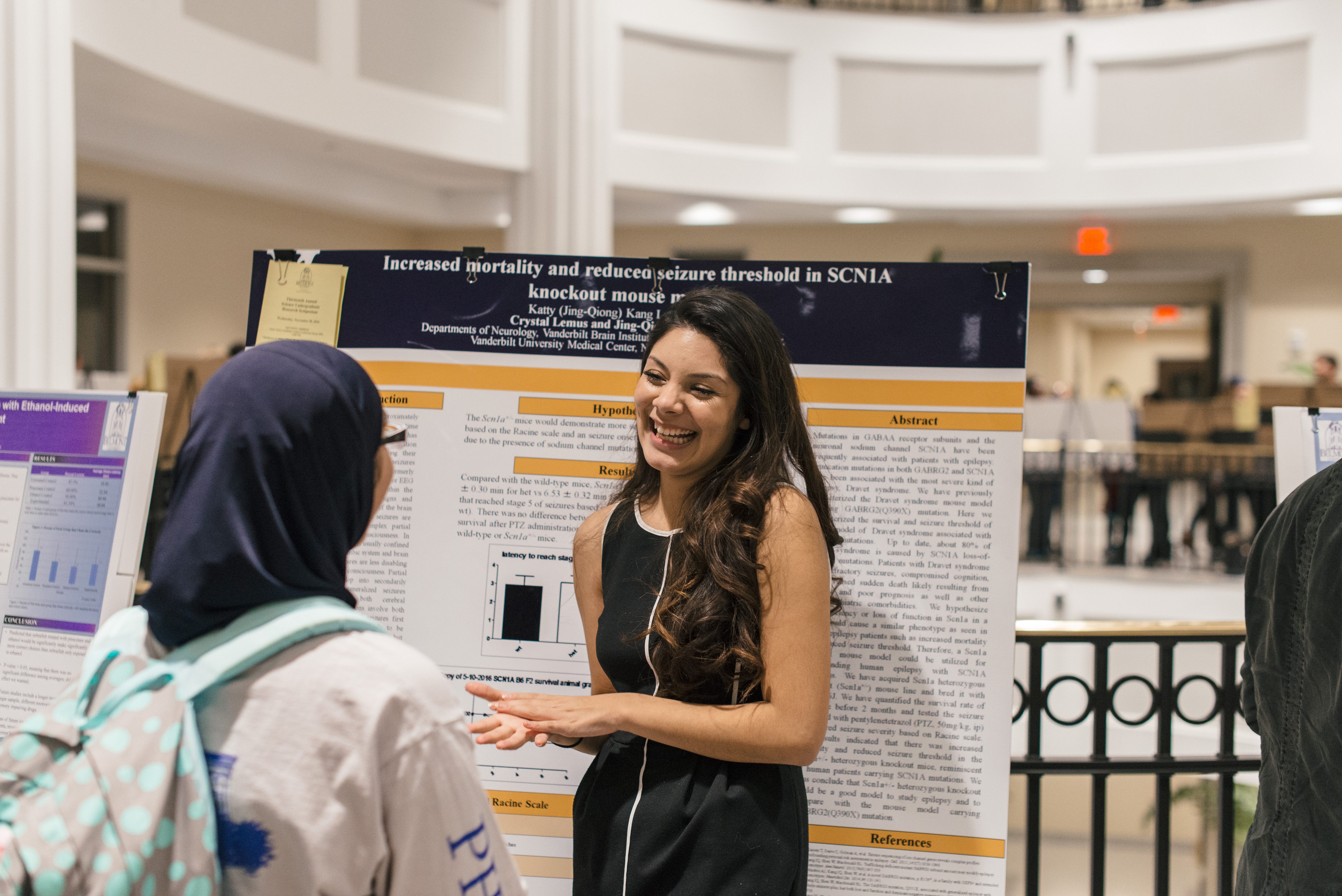 A student presents at this year's science undergraduate research symposium across campus.