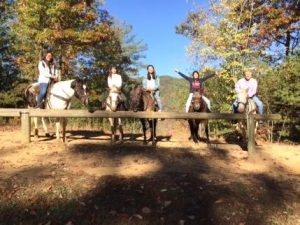 Estelle, Verona, Olivia, Ivy and Littlejohn on horseback in the Smokey Mountains