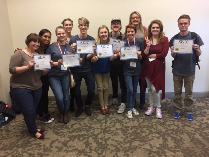 Belmont Vision staff members hold their awards at the Southeast Journalism Conference