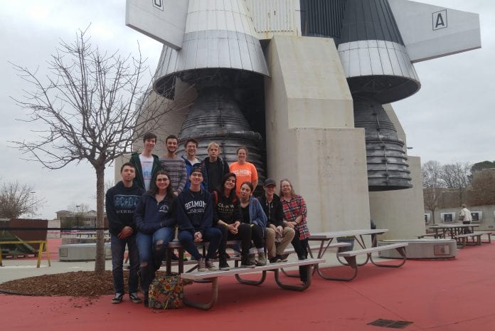 Student pose at the US Space and Rocket Center for a class excursion