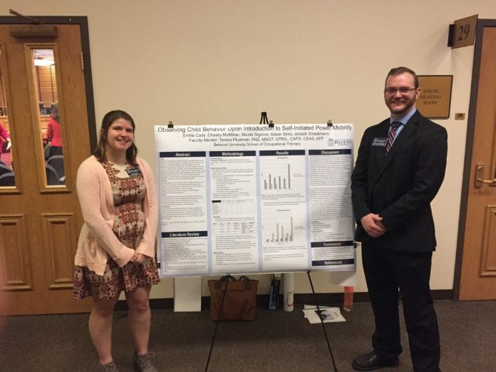 Straatmann and Edwards with their research poster