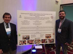 Stewart and Webb with their poster presentation