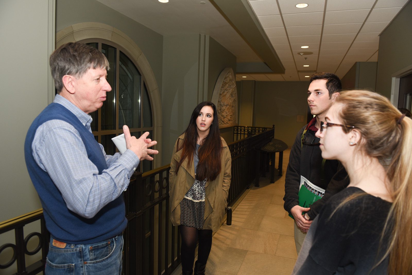 Dr. Davis advises students on their elevator pitches.