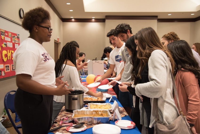 Students trying world cuisine at World Culture Fest