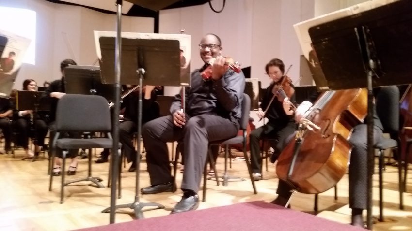 Belmont student viola player performs at a festival