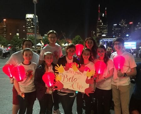 Students participate in a charity event, Light the Night 5K supporting lukemia and lymphoma.