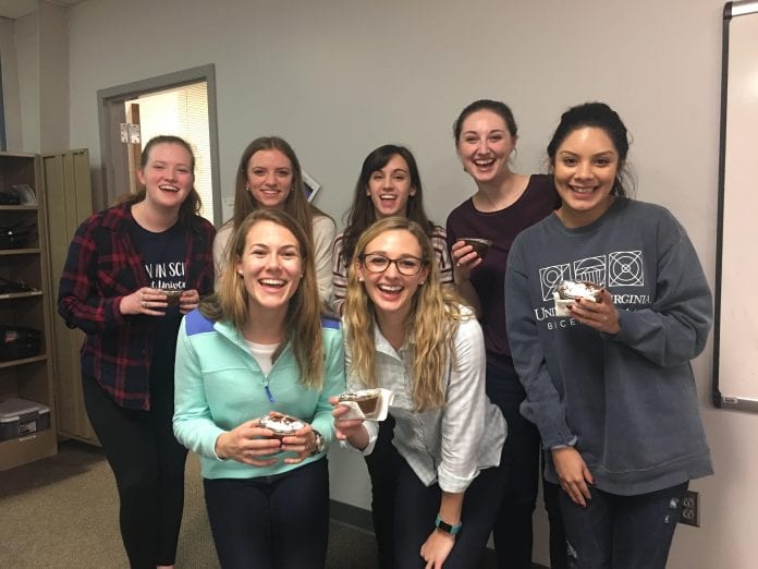 Students participate in a Women in Science Baking Event held on Belmont's campus.