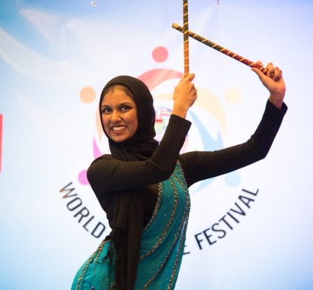 Student performing a cultural dance