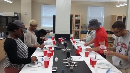 On-campus residents participate in the science lab