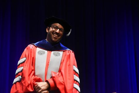 Dr. Edgar Diaz-Cruz, smiling in his regalia