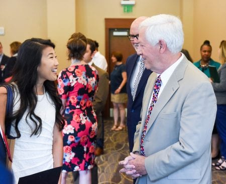 Columbia State student Anna Pollard, who will be the first to transfer to Belmont under the new articulation agreement, speaks with Belmont President Dr. Bob Fisher.