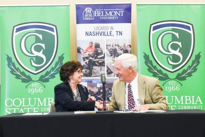 Columbia State President Dr. Janet Smith and Belmont University President Dr. Bob Fisher sign the articulation agreement.