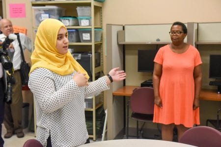 Iman shares her group's work with Mayor David Briley