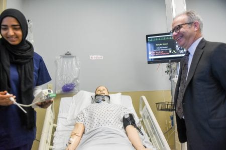 Mayor David Briley comes to school to meet students in the Opportunity Now Interns program at Belmont University in Nashville, Tennessee, June 19, 2018.