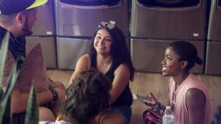 Students interview Bonnaroo attendees