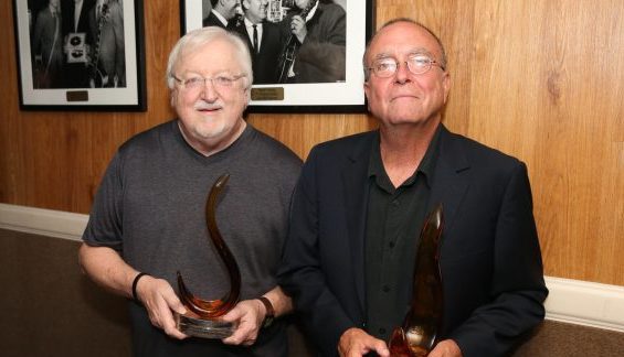 Songwriters Pat Alger and Tony Arata receive Flamekeeper Award.