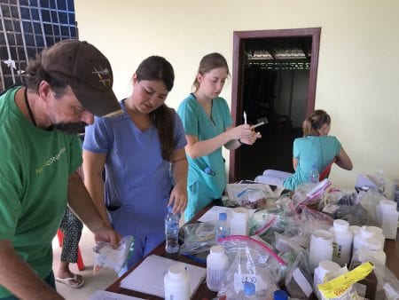 Students fill prescriptions during this missions experience in Cambodia