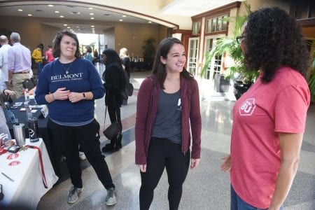 People talking at Health and Well being fair