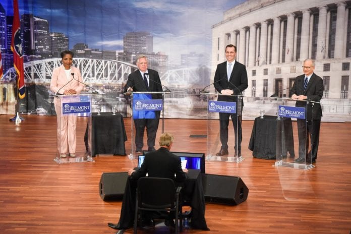 Mayor David Briley, At-Large Councilman John Cooper and former Vanderbilt professor- turned-national television analyst Carol Swain and Rep. John Ray Clemmons speak in a Nashville Mayoral debate in the McAfee Concert Hall on the campus of Belmont University in Nashville, Tennessee, July 9, 2019.