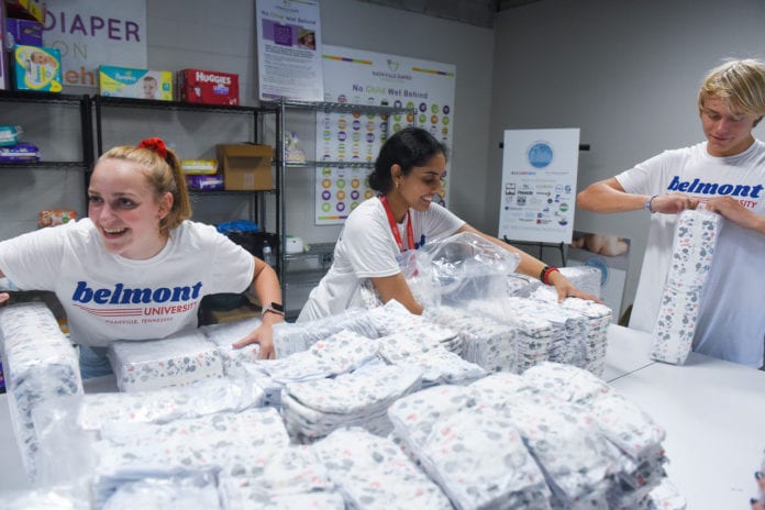 serve Student packaging diapers for Nashville Diaper Connection as part of annual day of service.