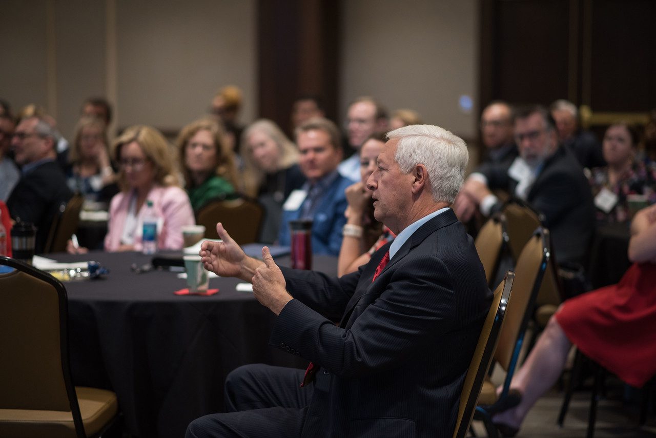 Dr. Fisher asks question during presentation