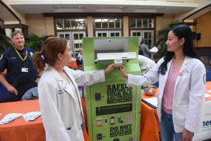 Pharmacy Students Demonstrate Using Safe Drug Deposit Box