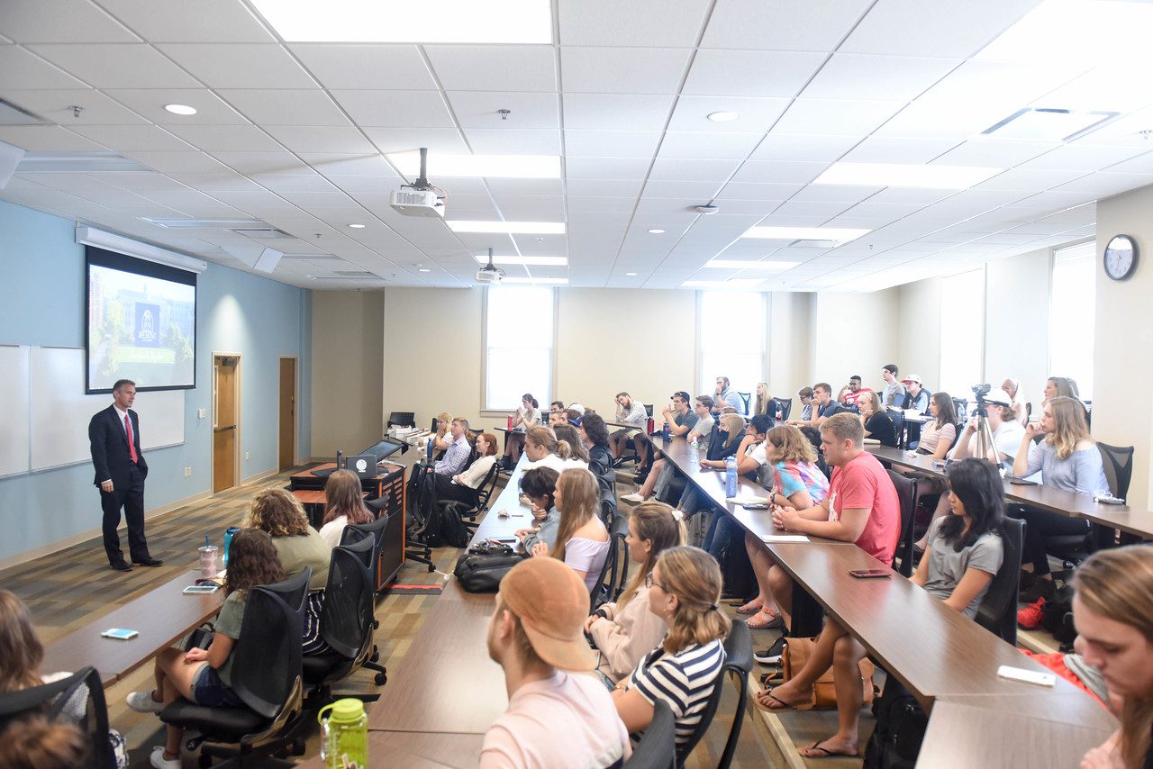 Jeff Morgheim, former BP executive, speaks at Belmont on September 27, 2019.