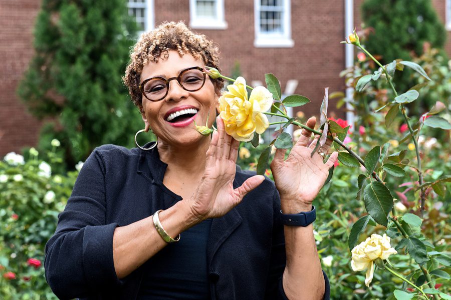 Searcy poses with flowers at Belmont