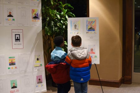 Two Boys Look at Essay Exhibit