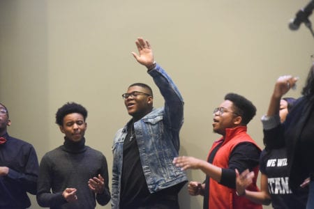 Students singing during workship night 