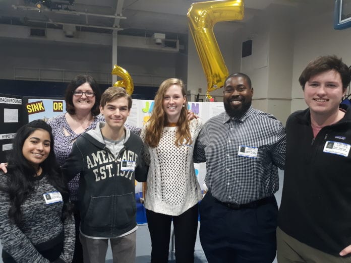 Dr. Danielle Garrett, assistant professor of chemistry education, with students Carlos McDay, Ryan Gagnon, Nancy Henin, Britton Townsley and Zach Hilt at Donelson Christian Academy Science Fair