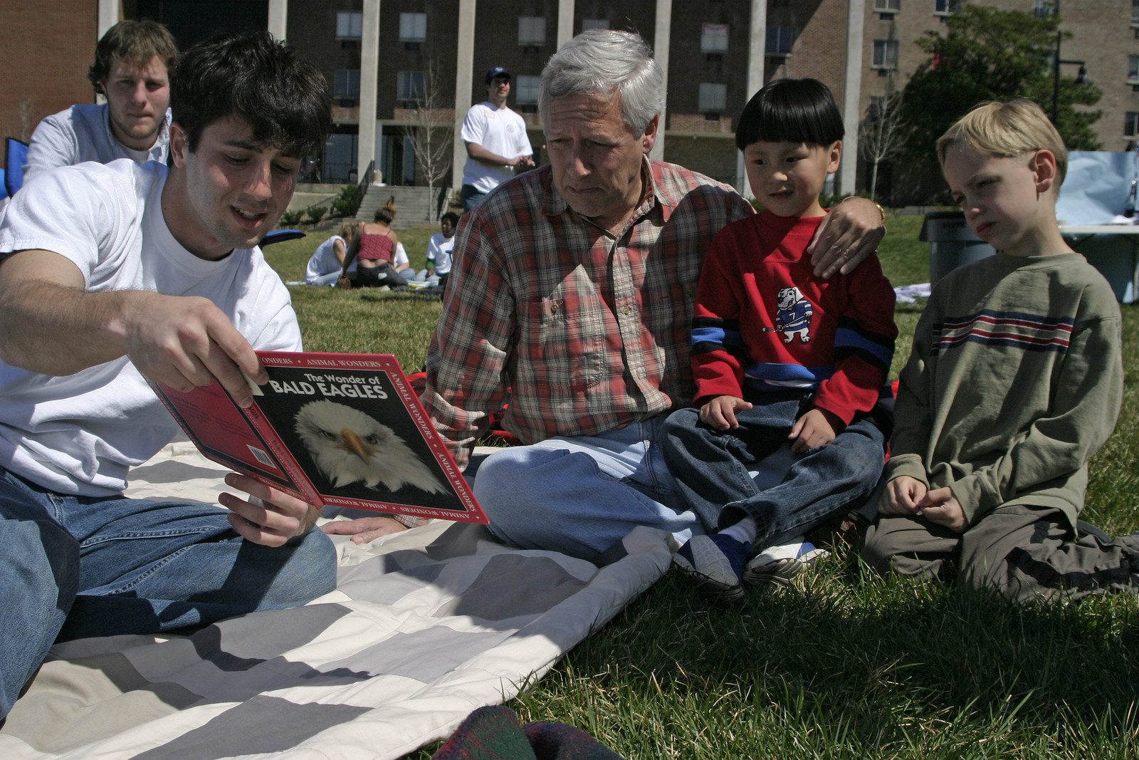Dr. Fisher reads with children & students