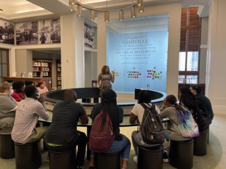 students listen to presentation