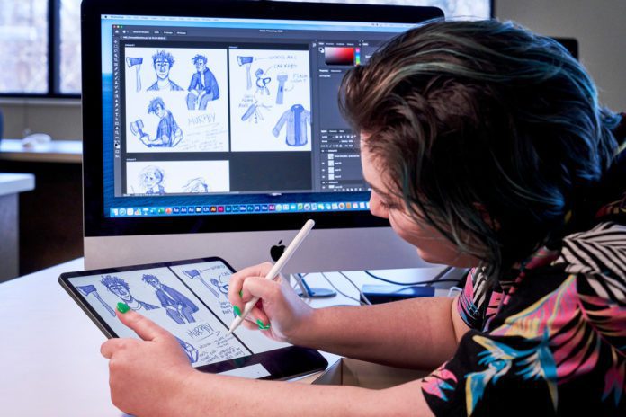 Student working on digital illustration