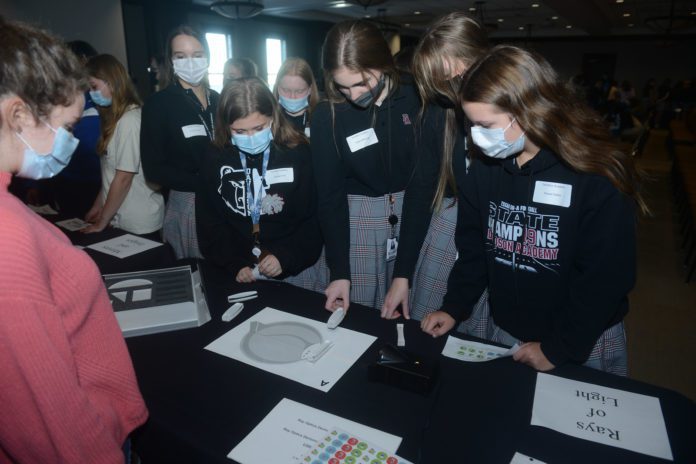 girls at science table