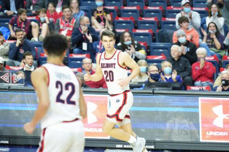 Belmont basketball player Tate Person runs down the court.