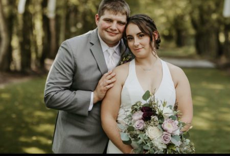 Smith with husband, Brandon Smith, on their wedding day