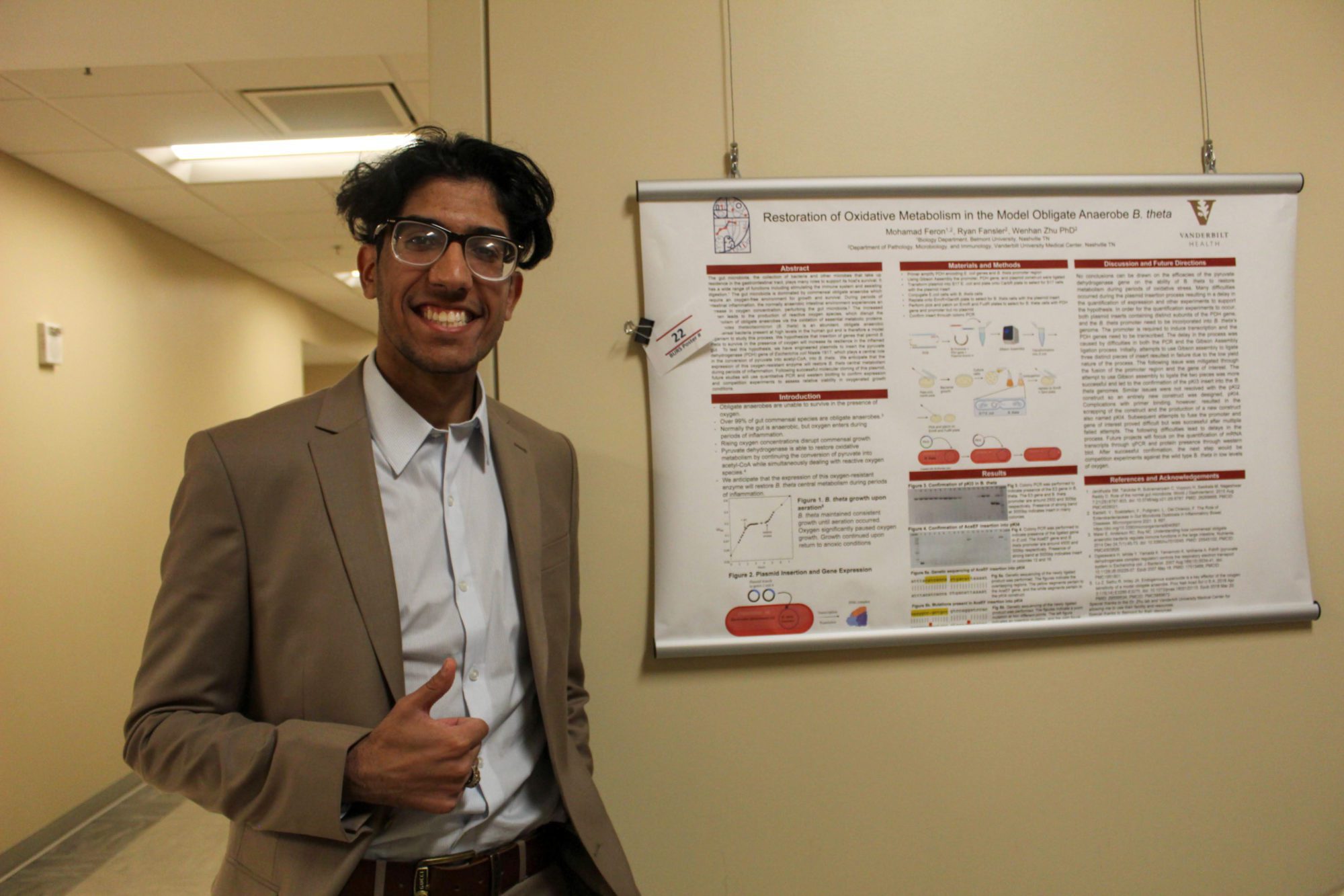 Student presenting poster