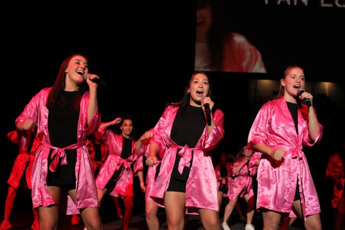 Phi Mu members perform at Greek Sing