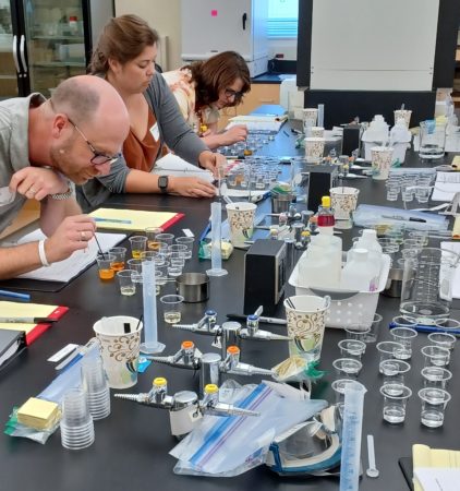 science teachers work in Belmont Lab